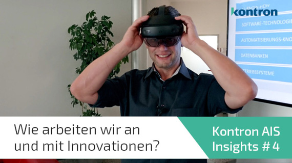 Eine Person mit Datenbrille schaut in die Kamera und lächelt